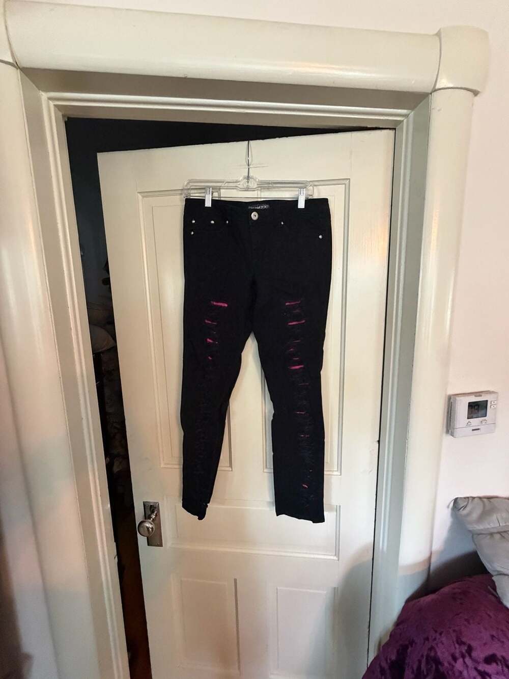Imperial Star Black Ripped Skinny Jeans with Pink Underlay